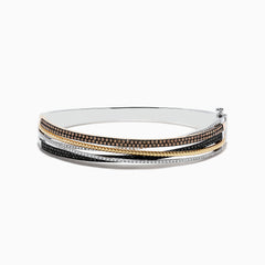 The 14K Trio-Color Gold Bangle features intertwined strands with brown, black, and white diamonds totaling 1.97 TCW, crafted in a polished finish for a sleek look.