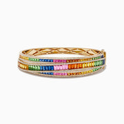 The Watercolors 14K Gold Multi Sapphire and Diamond Bangle features rows of vibrant multicolored sapphires bordered by shimmering white diamonds, all set in dazzling 14K gold.
