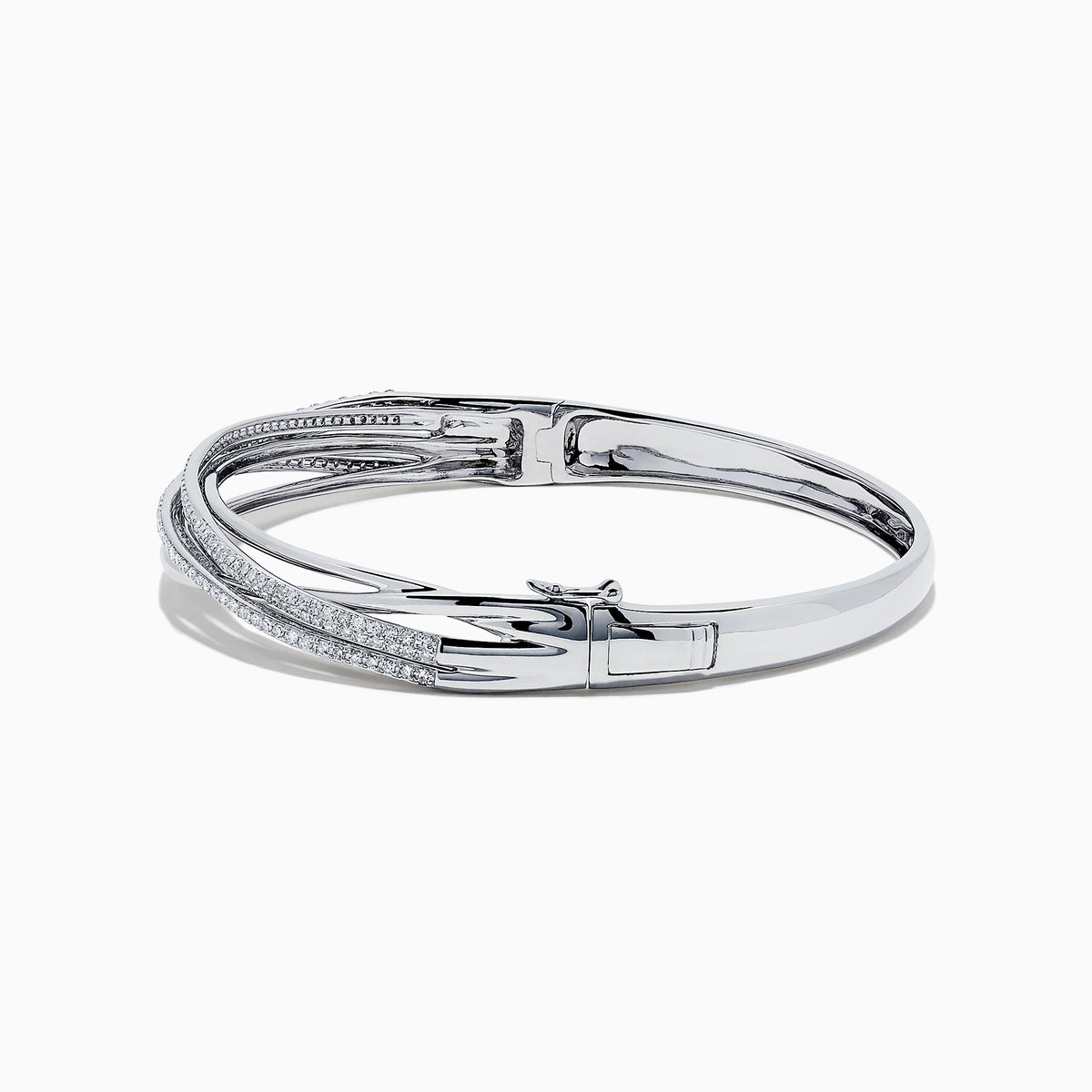 The 14K White Gold Diamond Cross Over Bangle, 1.05 TCW, features intertwined bands with dazzling diamonds, beautifully displayed on a white background.