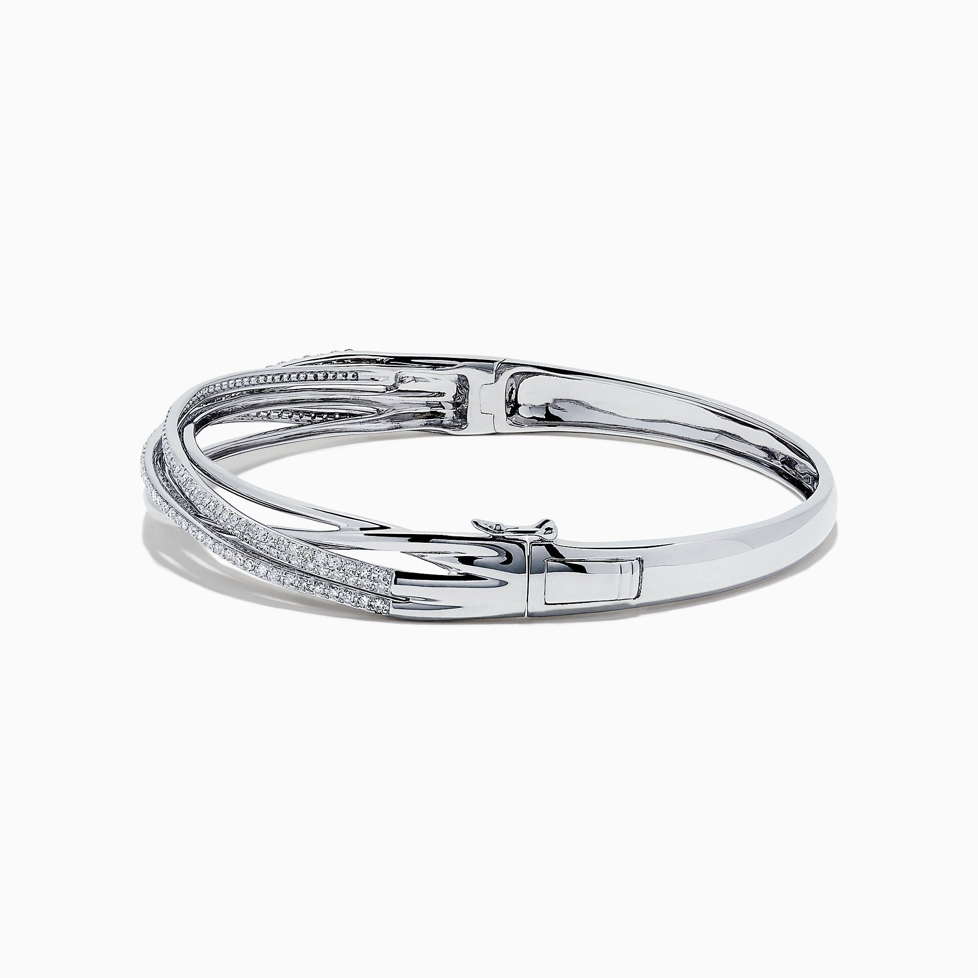 The 14K White Gold Diamond Cross Over Bangle, 1.05 TCW, features intertwined bands with dazzling diamonds, beautifully displayed on a white background.