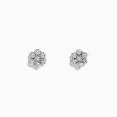 A pair of 14k White Gold Diamond bouquet studs, 0.52 TCW, features multiple round diamonds clustered in a floral design and set closely together in lustrous white gold.