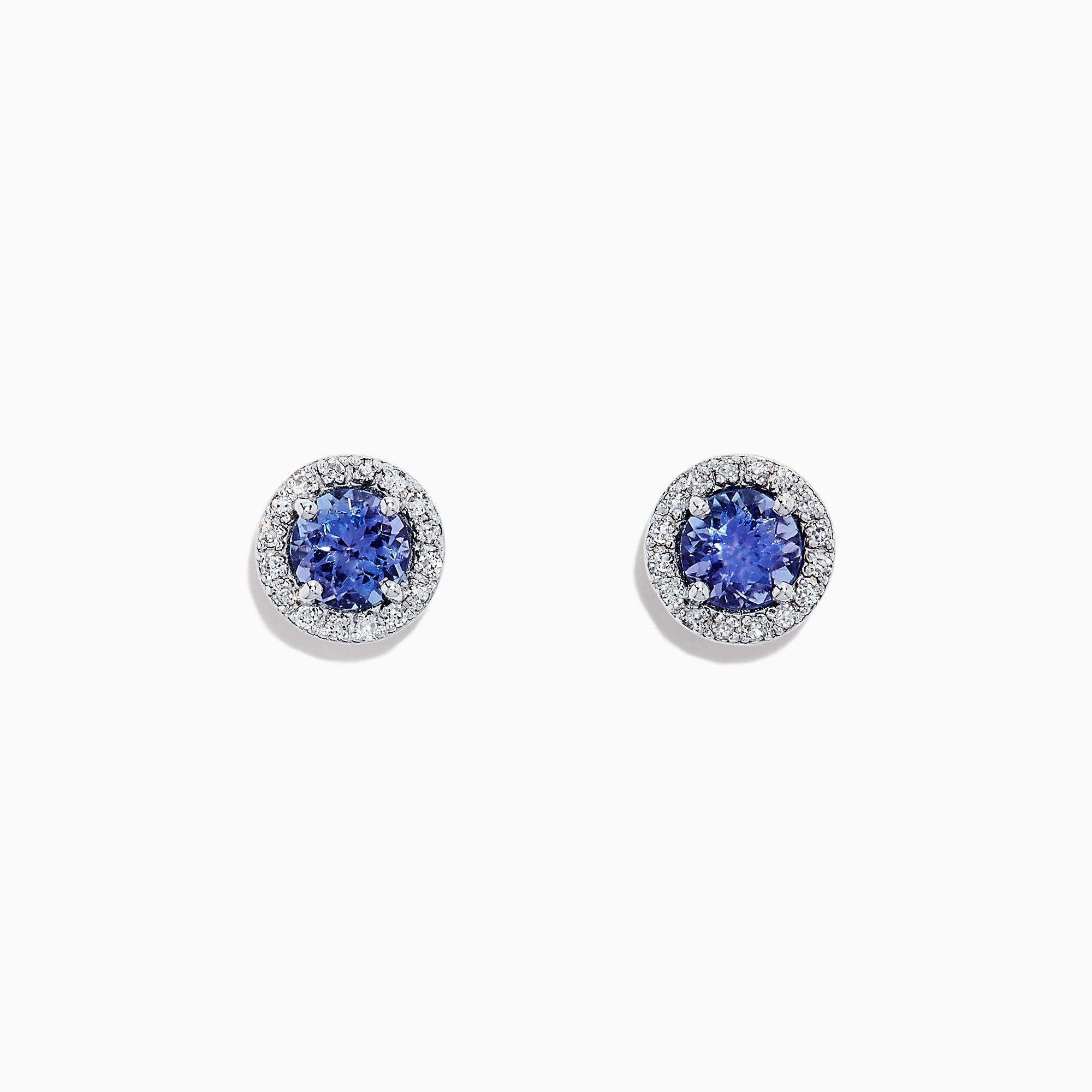 The Nahla Siri 14K White Gold Tanzanite and Diamond Stud Earrings, 1.04 TCW, feature vivid blue tanzanites encircled by sparkling diamonds in a polished white gold setting.