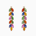 The Watercolor 14K Yellow Gold Multi Sapphire and Diamond Drop Earrings feature marquise-cut sapphires in green, orange, blue, pink, and yellow, arranged vertically in a leaf-like pattern with sparkling diamonds at the top.