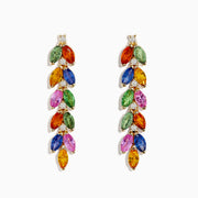 The Watercolor 14K Yellow Gold Multi Sapphire and Diamond Drop Earrings feature marquise-cut sapphires in green, orange, blue, pink, and yellow, arranged vertically in a leaf-like pattern with sparkling diamonds at the top.