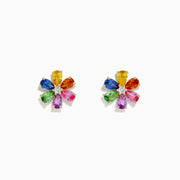 Watercolors 14K Gold Multi Sapphire and Diamond Flower Stud Earrings feature vibrant blue, yellow, orange, green, purple, and pink sapphires in a dazzling floral design with sparkling diamonds on each petal.