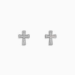 The 925 Sterling Silver Diamond Cross Stud Earrings are small, sterling silver cross-shaped studs adorned with sparkling gemstones, shown on a white background.
