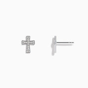 The 925 Sterling Silver Diamond Cross Stud Earrings are small, sterling silver cross-shaped studs adorned with sparkling gemstones, shown on a white background.