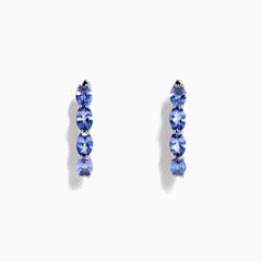 A pair of 925 Sterling Silver Tanzanite hoop earrings by Effy, total carat weight 3.49, featuring four round blue gemstones set vertically against a white background.