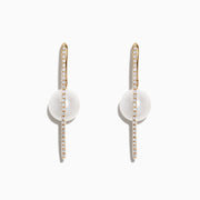 The 14K Gold Cultured Fresh Water Pearl & Diamond Hoop Earrings, 0.20 TCW, showcase a vertical row of diamonds with a round freshwater pearl behind each diamond bar, presented on a white background.