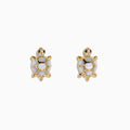 14K yellow gold stud earrings in a turtle shape with multi diamonds and mother of pearl shells, displayed on a white background.