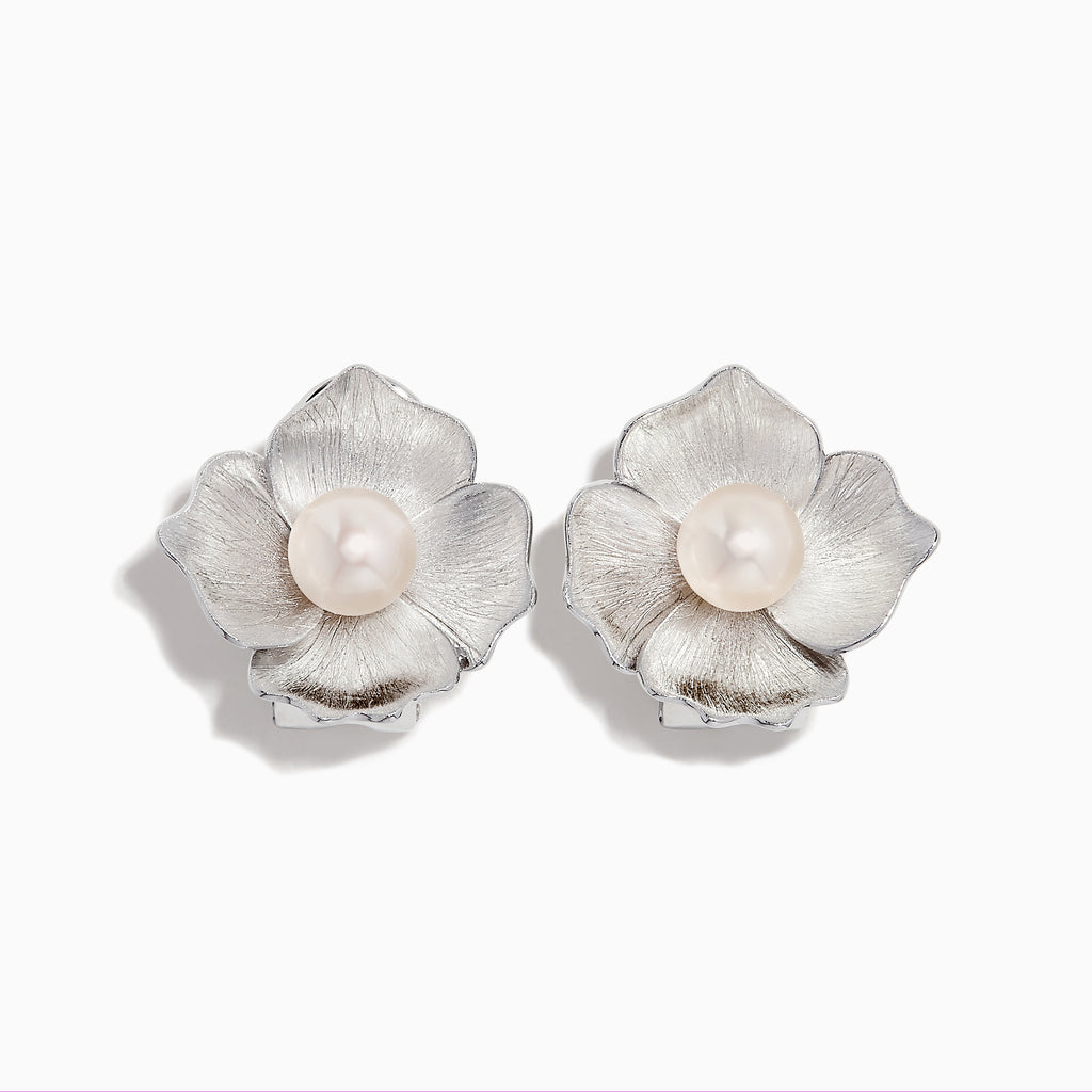 The 925 Sterling Silver Cultured Fresh Water Pearl Flower Earrings feature textured silver petals and a round freshwater pearl at each center, shown on a white background.