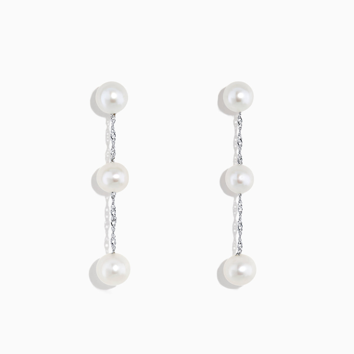 A pair of 14K White Gold Cultured Fresh Water Pearl Drop Earrings, each with three round pearls linked by slender silver chains, shown on a plain white background.