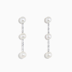 A pair of 14K White Gold Cultured Fresh Water Pearl Drop Earrings, each with three round pearls linked by slender silver chains, shown on a plain white background.