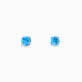 The Ocean Bleu 14K White Gold Blue Topaz Stud Earrings, 2.30 TCW, feature round faceted stones in prong settings and are displayed on a plain white background.