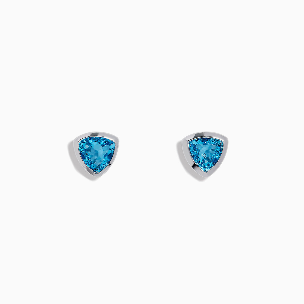 A pair of Ocean Blue 14K White Gold Bezel Set Blue Topaz Stud Earrings with triangular gemstones, inspired by the Effy Ocean Blue collection, shown against a white background.