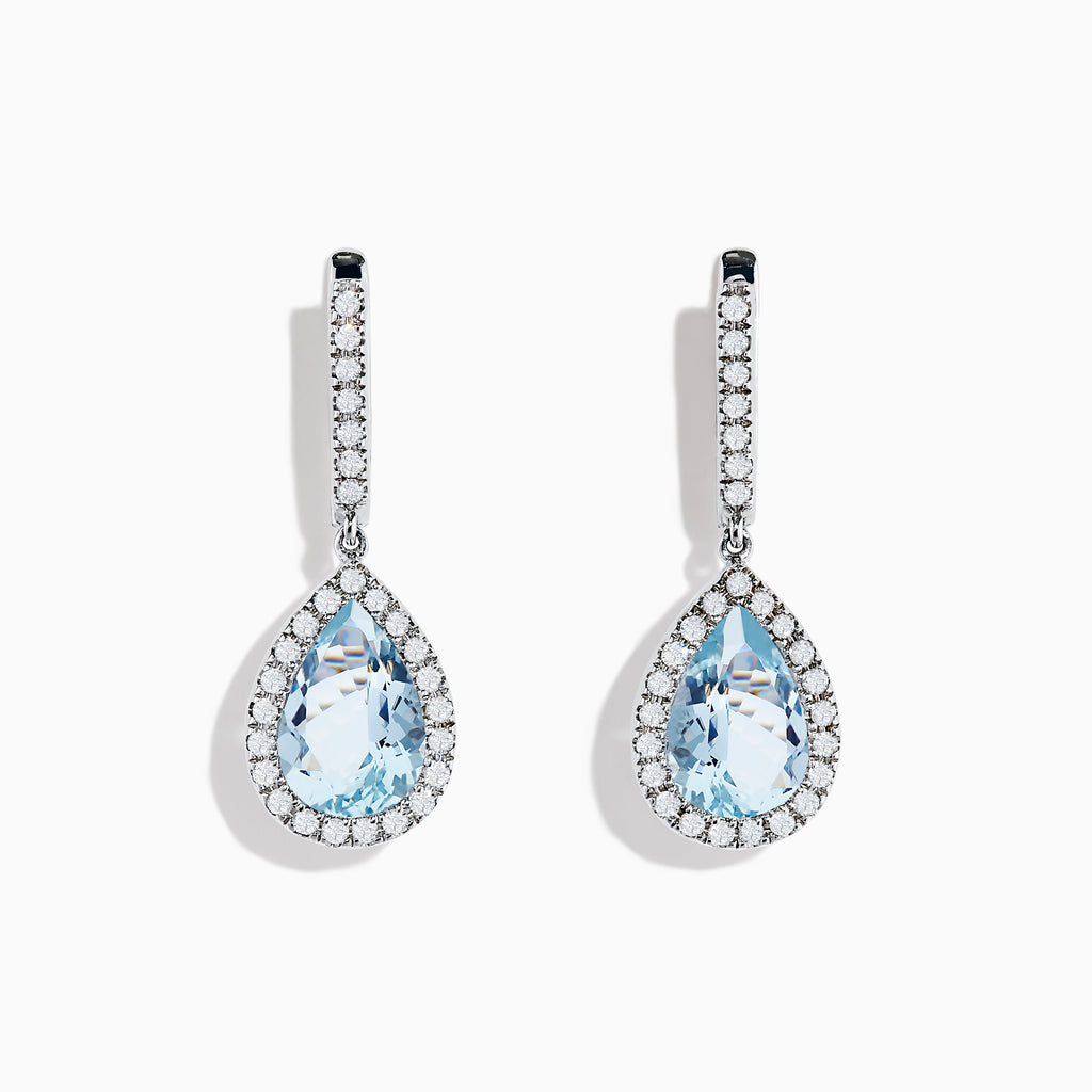 The Aquarius 14K White Gold Aquamarine and Diamond Drop Earrings feature pear-shaped Aquamarine gemstones with diamond halos and a row of diamonds on the hooks.