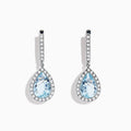 The Aquarius 14K White Gold Aquamarine and Diamond Drop Earrings feature pear-shaped Aquamarine gemstones with diamond halos and a row of diamonds on the hooks.
