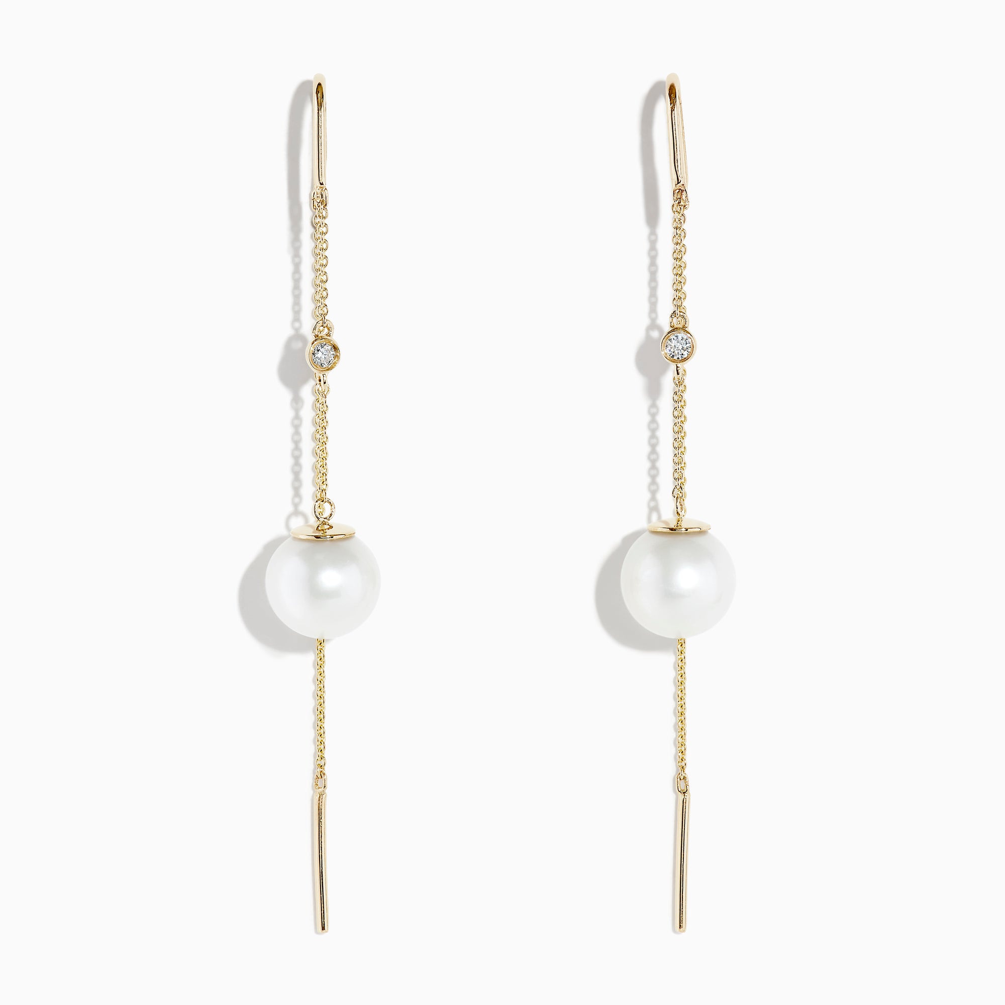 The 14K Yellow Gold Pearl and Diamond Drop Earrings feature a single white pearl and round diamond on each, accented with thin gold chains and bars.