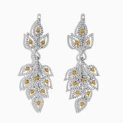 The 18K White Gold White and Fancy Yellow Diamond Leaf Drop Earrings, 2.75 TCW, feature a cascading leaf design with white gemstones and fancy yellow diamonds on a sleek white gold setting.