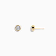 The 14K Two-Tone Gold Bezel Set Diamond Solitaire Stud Earrings (0.23 TCW) feature sparkling diamonds in a classic bezel setting, reminiscent of timeless solitaires, showcased against a plain white background.