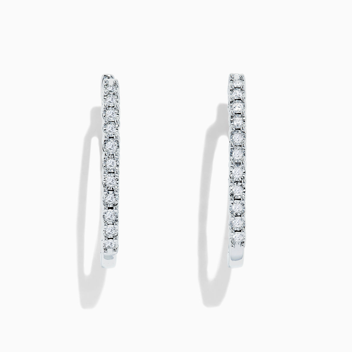 The 925 Sterling Silver Diamond Hoop Earrings, featuring small round diamonds totaling 0.24 TCW, are displayed upright on a white background to showcase the sparkling stones along the front edge.
