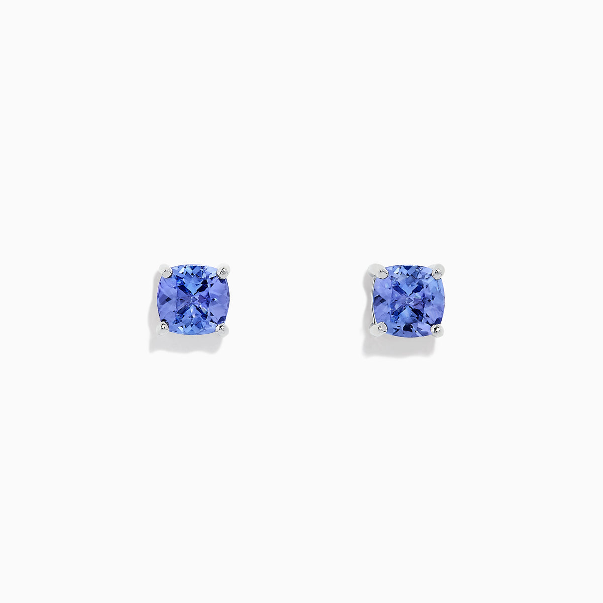 The Nahla Siri Sterling Silver Tanzanite Stud Earrings, 0.95 TCW, feature square-cut vibrant blue tanzanite gemstones set in simple prongs and are displayed against a plain white background.
