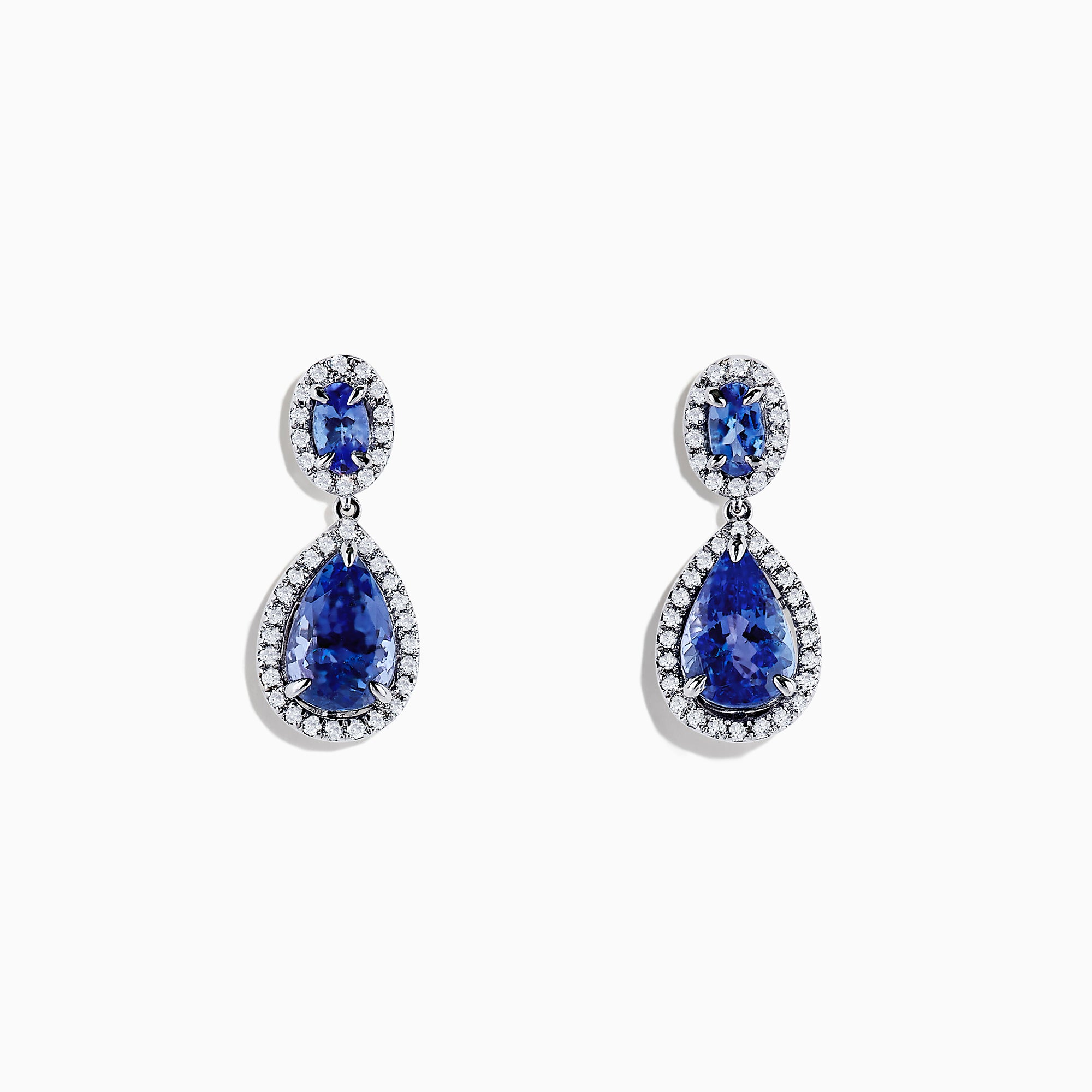 Nahla Siri 14K Gold Tanzanite and Diamond Earrings, 2.90 TCW, showcase elegant oval and teardrop blue tanzanites bordered by sparkling diamonds in a 14K gold setting on a white background.