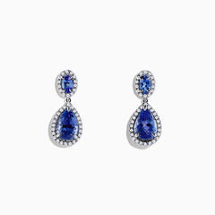 Nahla Siri 14K Gold Tanzanite and Diamond Earrings, 2.90 TCW, showcase elegant oval and teardrop blue tanzanites bordered by sparkling diamonds in a 14K gold setting on a white background.