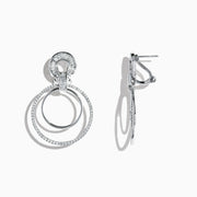 The Classique 14K White Gold Diamond Drop Earrings, 1.12 TCW, showcase two interlocking circles— the larger ones adorned with sparkling diamonds— presented against a plain white background.