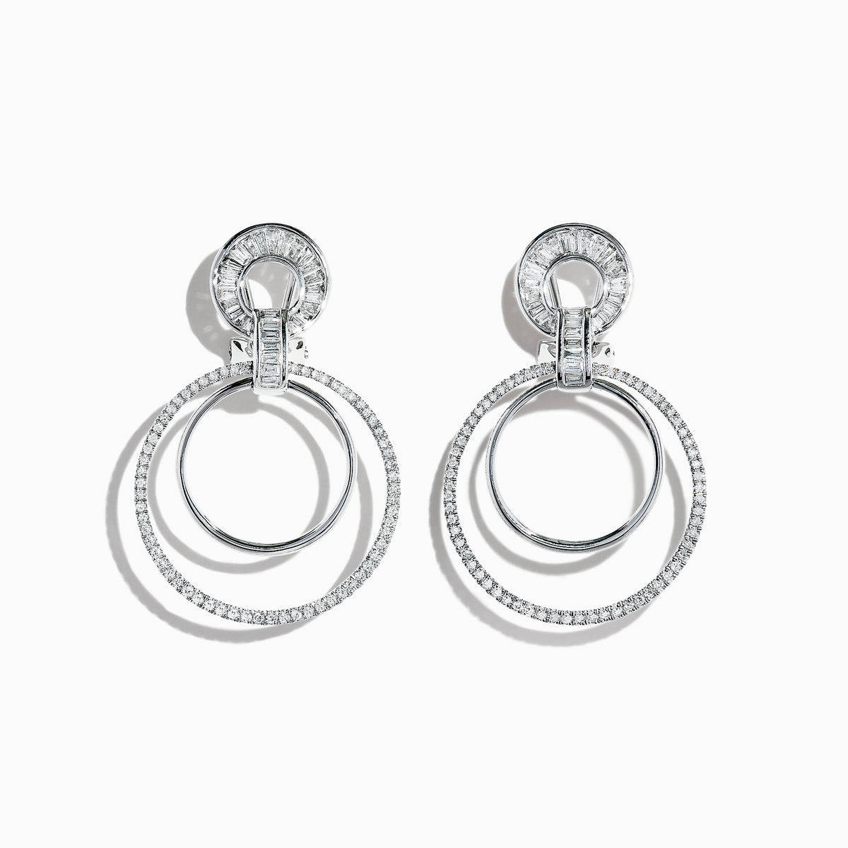The Classique 14K White Gold Diamond Drop Earrings, 1.12 TCW, showcase two interlocking circles— the larger ones adorned with sparkling diamonds— presented against a plain white background.