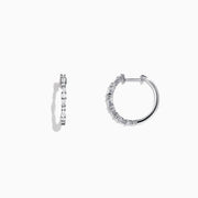 The Classique 14K White Gold Diamond Hoop Earrings, 0.37 TCW, feature delicate hoops each set with sparkling round diamonds and are shown against a plain white background.