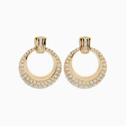 Introducing the D’Oro 14K Yellow Gold Diamond Drop Earrings: a stunning pair of Effy earrings beautifully crafted from lustrous 14K yellow gold, featuring double circles adorned with sparkling diamonds. Elegantly displayed against a white background, these earrings are perfect for those who appreciate the timeless allure of diamond drop designs.