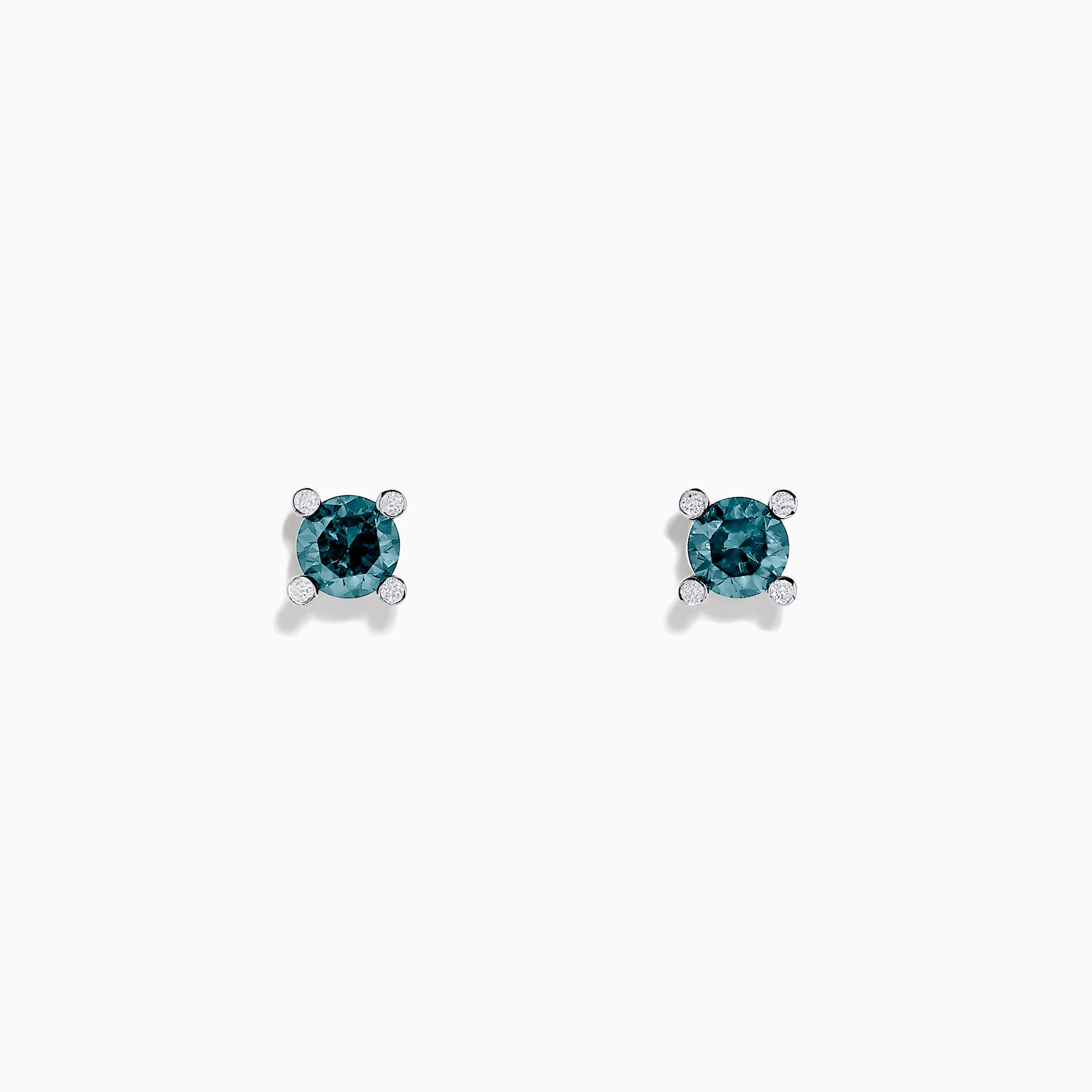 The 14K White Gold Blue Diamond Stud Earrings, 1.03 TCW, feature round blue diamonds set in four-prong white gold settings and are shown on a plain white background.