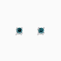 The 14K White Gold Blue Diamond Stud Earrings, 1.03 TCW, feature round blue diamonds set in four-prong white gold settings and are shown on a plain white background.