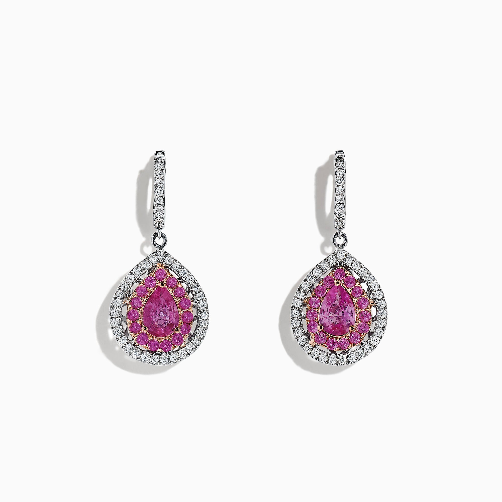 Experience elegance with these 14K two-tone gold drop earrings featuring pear-shaped pink sapphires and sparkling diamonds, totaling 2.73 carats. Perfectly crafted for a touch of luxurious sophistication.