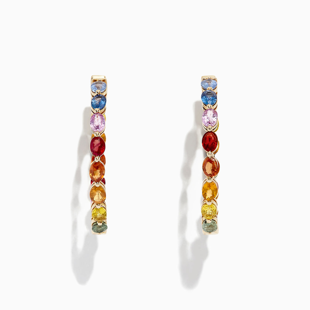 The Watercolors 14K Yellow Gold Multi Sapphire 1 Hoop Earrings (6.18 TCW) feature a rainbow arrangement of sapphires and are shown against a white background with a subtle shadow.