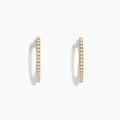 The DOro 14K Yellow Gold 3/4 Diamond Hoop Earrings feature small round diamonds totaling 0.31 TCW, shown on a plain white background.