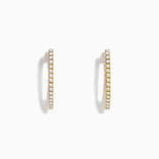The DOro 14K Yellow Gold 3/4 Diamond Hoop Earrings feature small round diamonds totaling 0.31 TCW, shown on a plain white background.