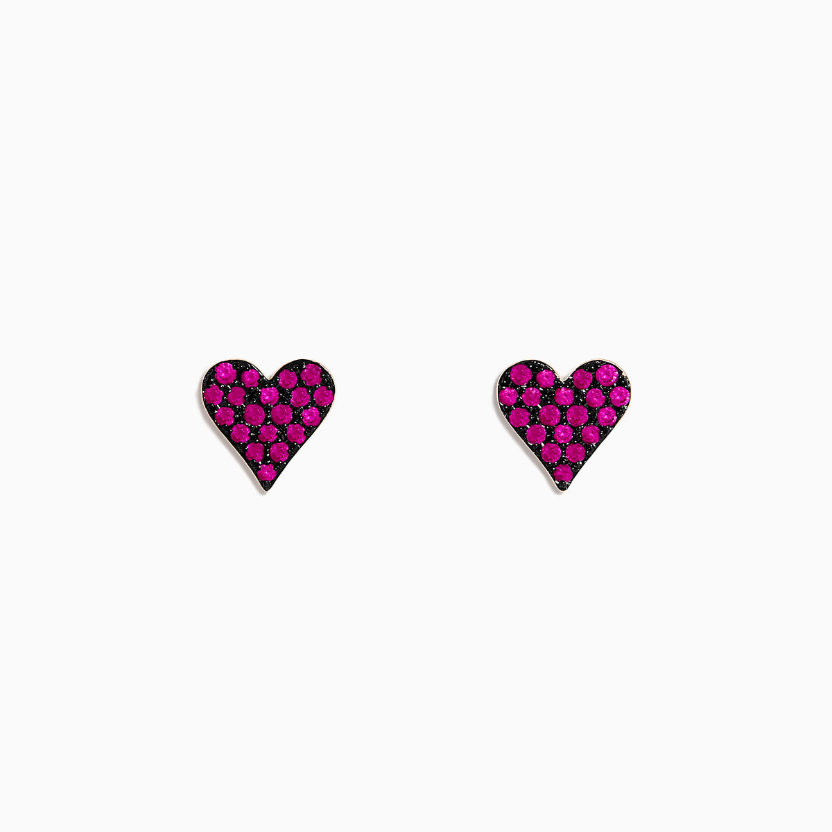 A pair of 14K Rose Gold Ruby Pave Heart Stud Earrings with bright pink gemstones is shown on a plain white background.