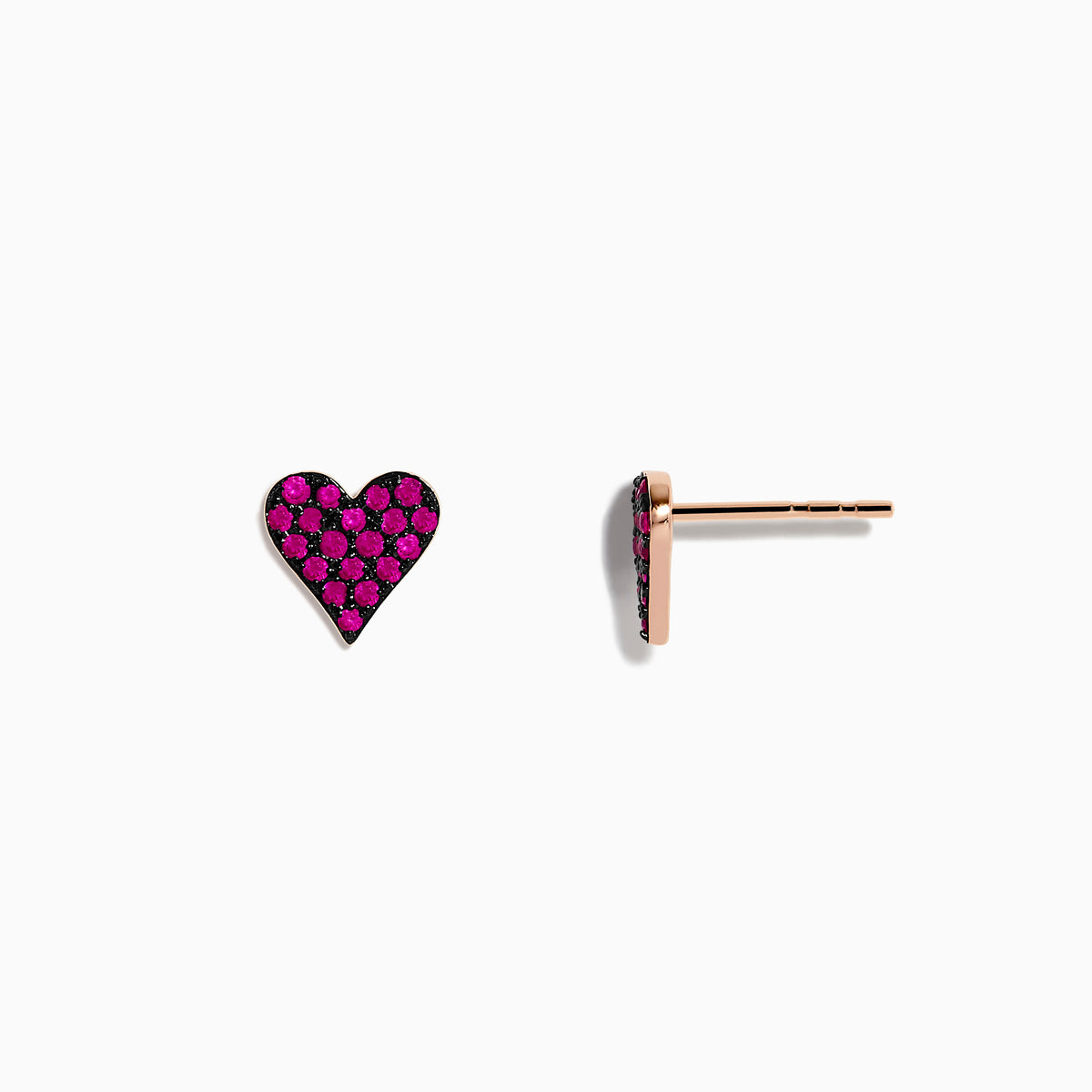 A pair of 14K Rose Gold Ruby Pave Heart Stud Earrings with bright pink gemstones is shown on a plain white background.