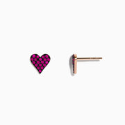 A pair of 14K Rose Gold Ruby Pave Heart Stud Earrings with bright pink gemstones is shown on a plain white background.