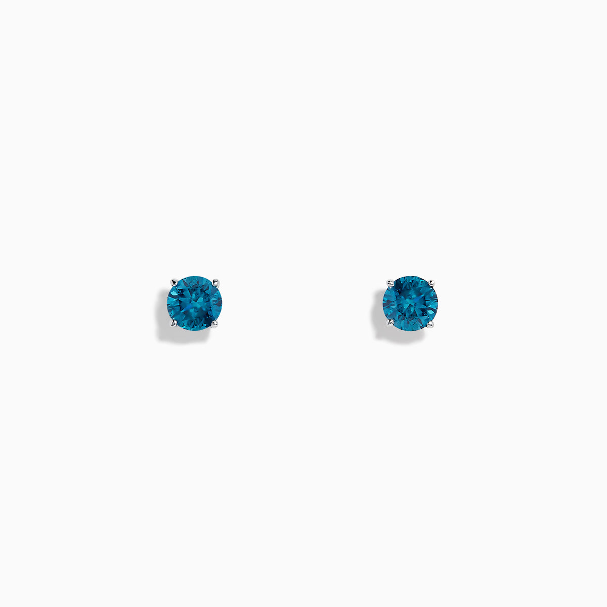 The Bella Bleu 14K White Gold Blue Diamond Stud Earrings feature round blue diamonds in classic prong settings, shown against a plain white background.
