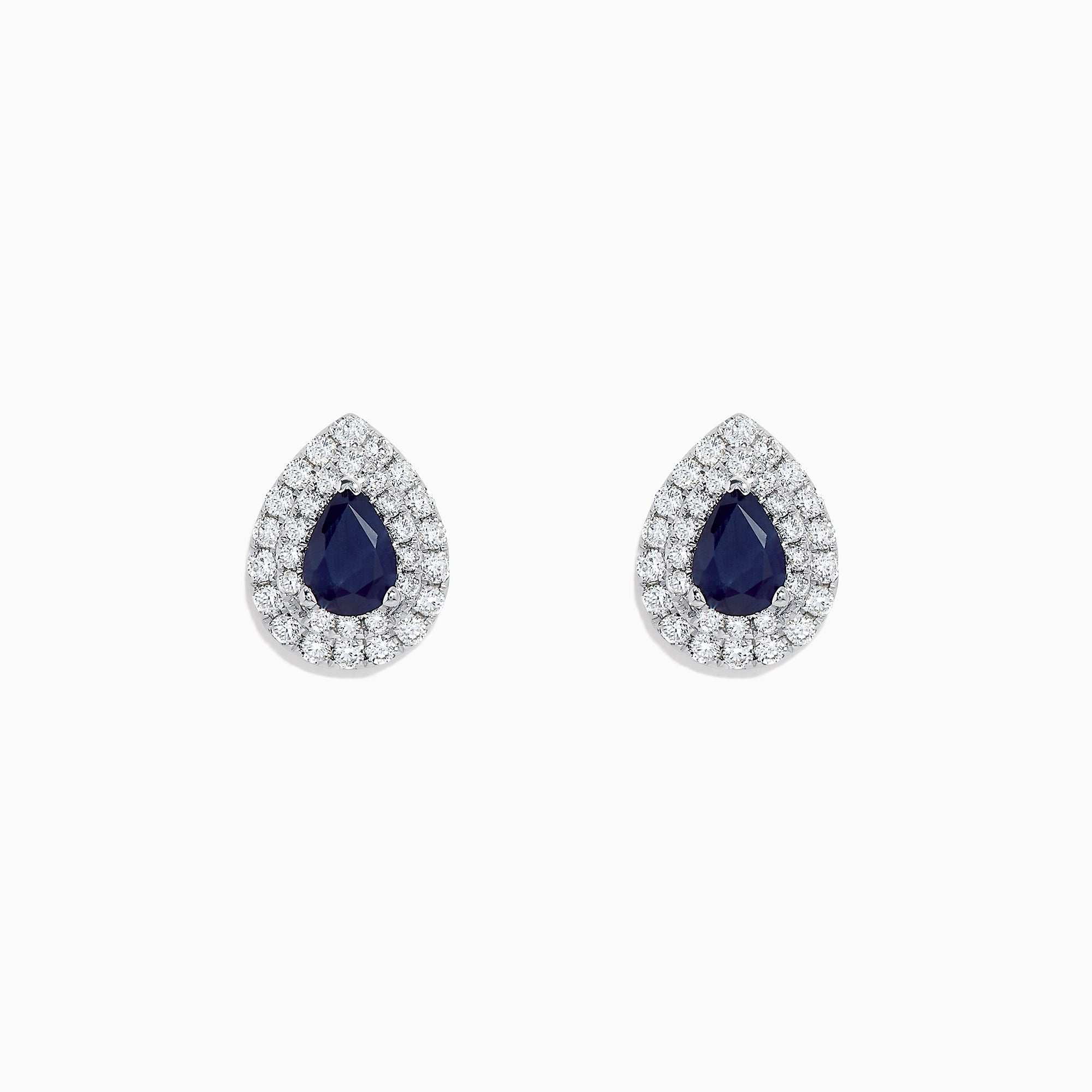 Royale Bleu 14K White Gold Pear Shaped Sapphire and Diamond Stud Earrings (2.23 TCW) feature dark blue sapphires at the center, encircled by two rows of sparkling diamonds in a white gold setting.