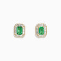 The 14K Yellow Gold Baguette Diamond Halo Emerald Stud Earrings feature rectangular green emerald centers framed by small diamonds and baguette-cut stones.