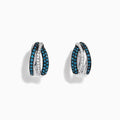 The Bella Bleu 14K White Gold White and Blue Diamond Mini Hoop Earrings feature intertwined bands with sparkling blue and clear stones, reminiscent of blue diamond earrings, shown on a white background.