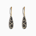These 14K yellow gold drop earrings feature teardrop pendants with an intricate espresso, black, and white diamond design, totaling 1.26 TCW.