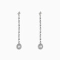The Classique 14K White Gold Diamond Drop Earrings, 0.72 TCW, feature a linear design of sparkling diamonds ending in an oval-shaped, gem-encrusted drop on each elegant earring.