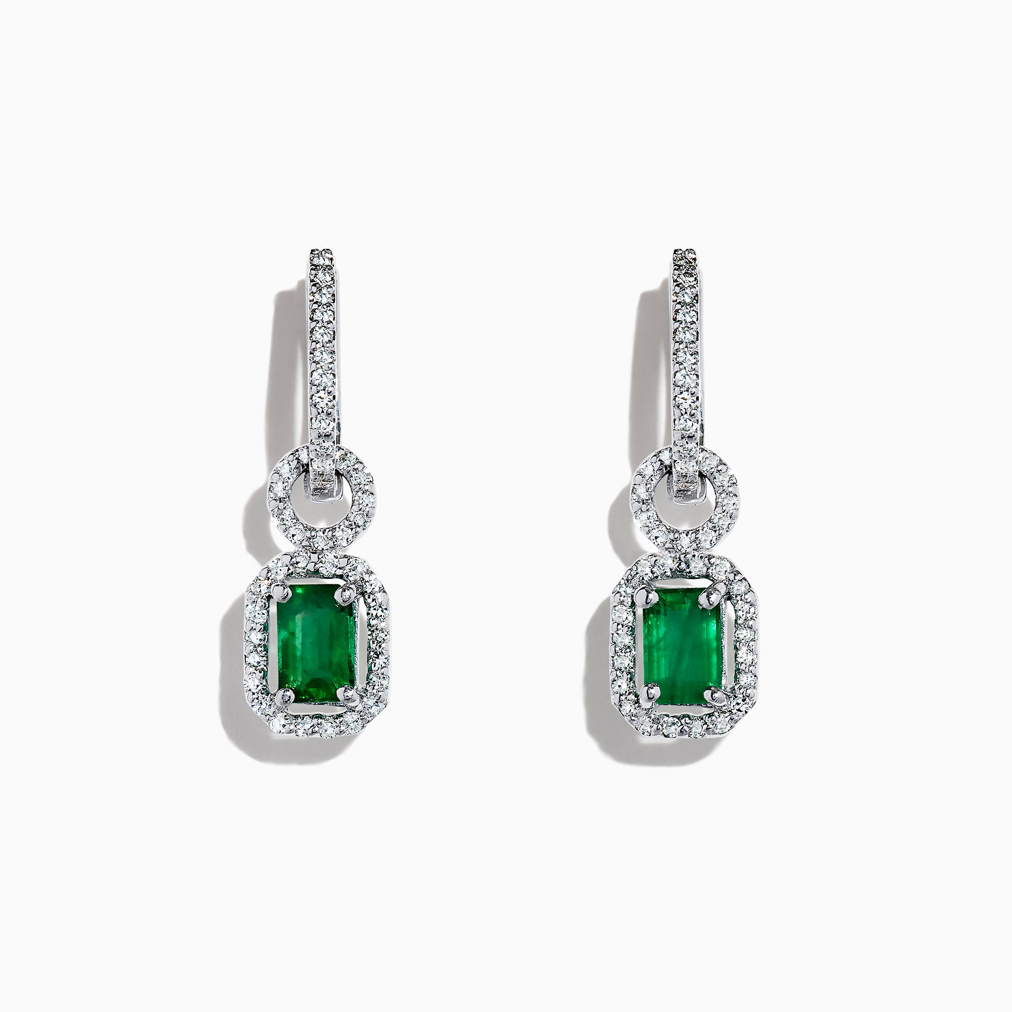 The Brasilica 14K White Gold Emerald and Diamond Drop Earrings, 1.47 TCW, feature rectangular gemstones in an elegant drop design, beautifully displayed on a white background.