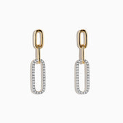 Modern and elegant, the DOro 14K Yellow Gold Diamond Paperclip Earrings feature two elongated oval links—the top in plain gold, the bottom encrusted with 0.29 TCW sparkling diamonds—for a contemporary twist on classic style.