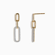 Modern and elegant, the DOro 14K Yellow Gold Diamond Paperclip Earrings feature two elongated oval links—the top in plain gold, the bottom encrusted with 0.29 TCW sparkling diamonds—for a contemporary twist on classic style.